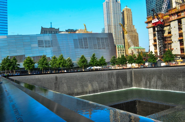 there is a water feature on top of a wall