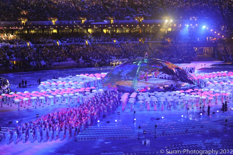 a crowd is gathered for the opening ceremony