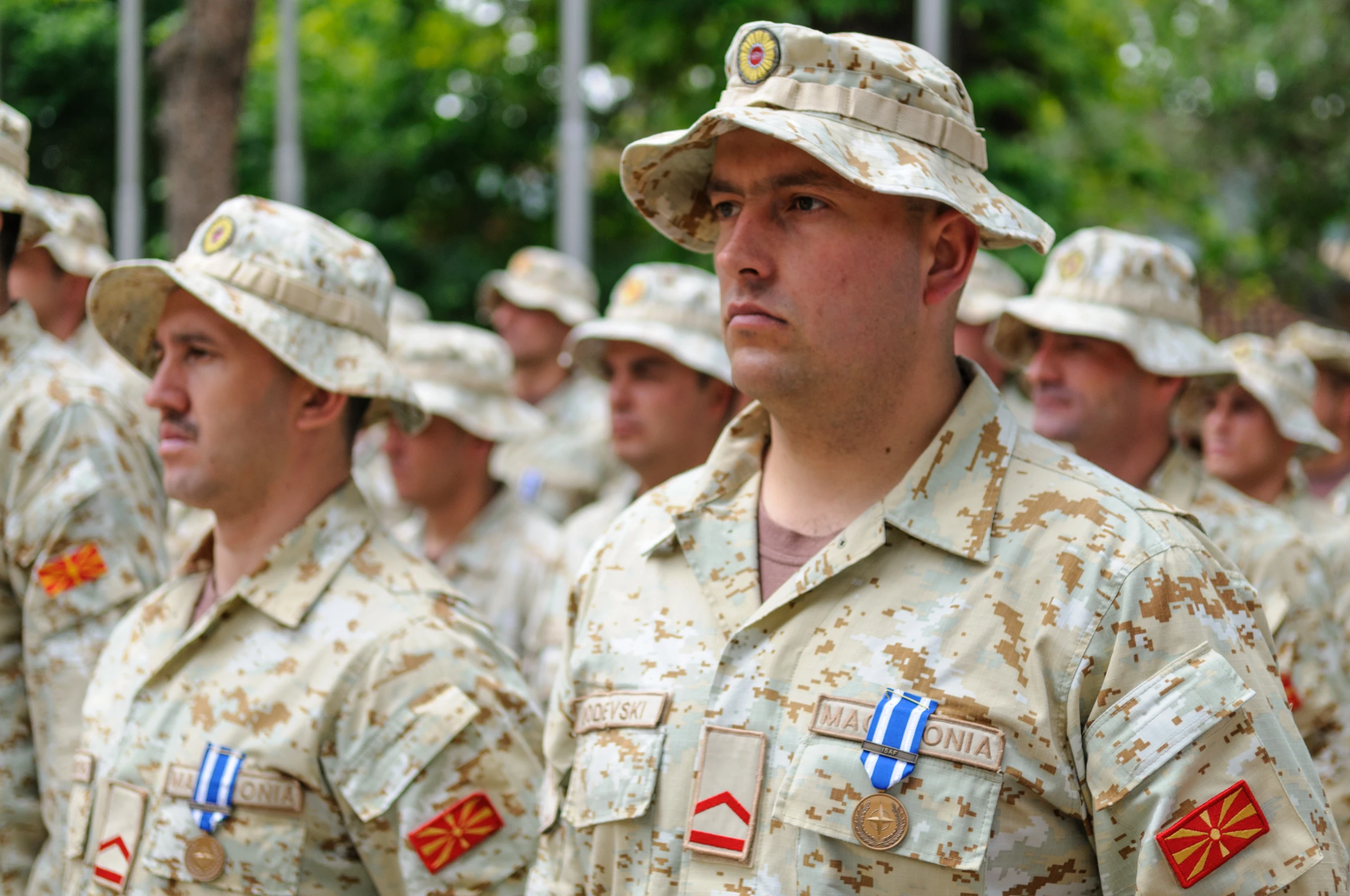 soldiers in their uniforms are facing different directions