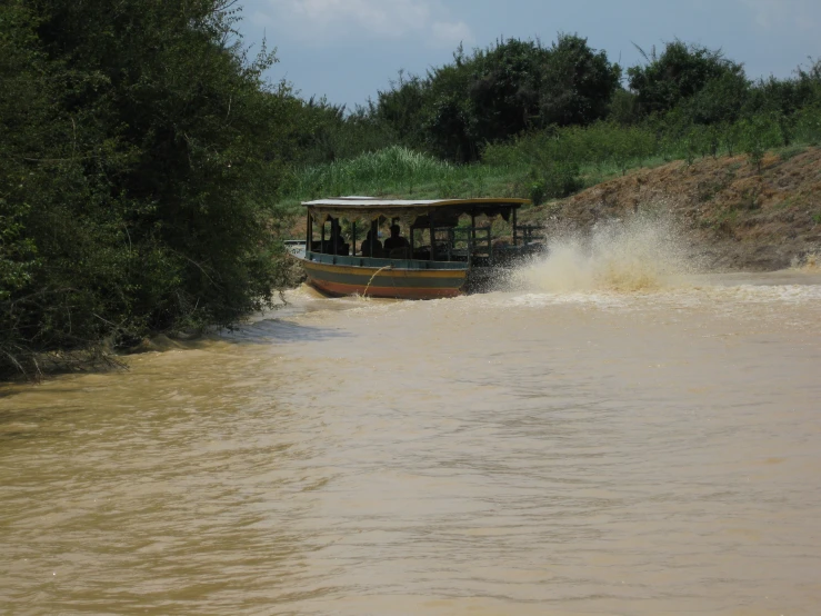 a large boat is going down the water