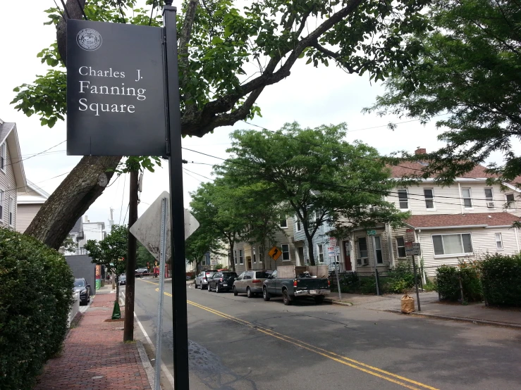 a street sign is on the corner of the street