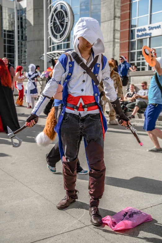 some people dressed as a pirate and some are standing with their guns