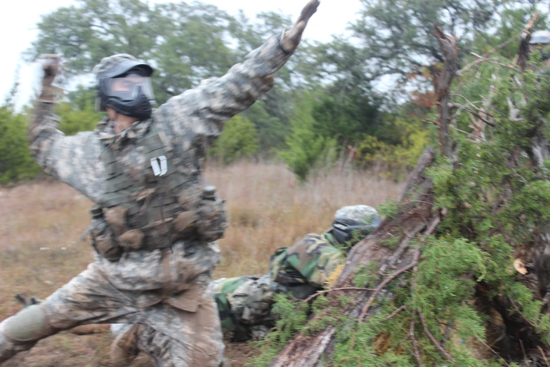 soldiers from army forces with helmets and uniform are in action