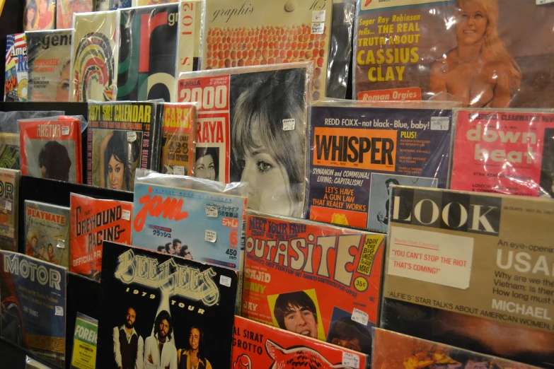 the wall is full of records that are stacked up