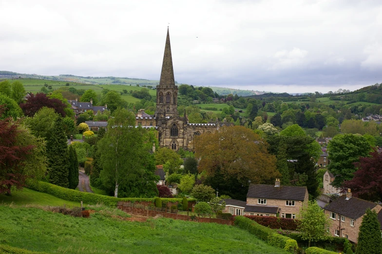 a lush green valley filled with lots of trees