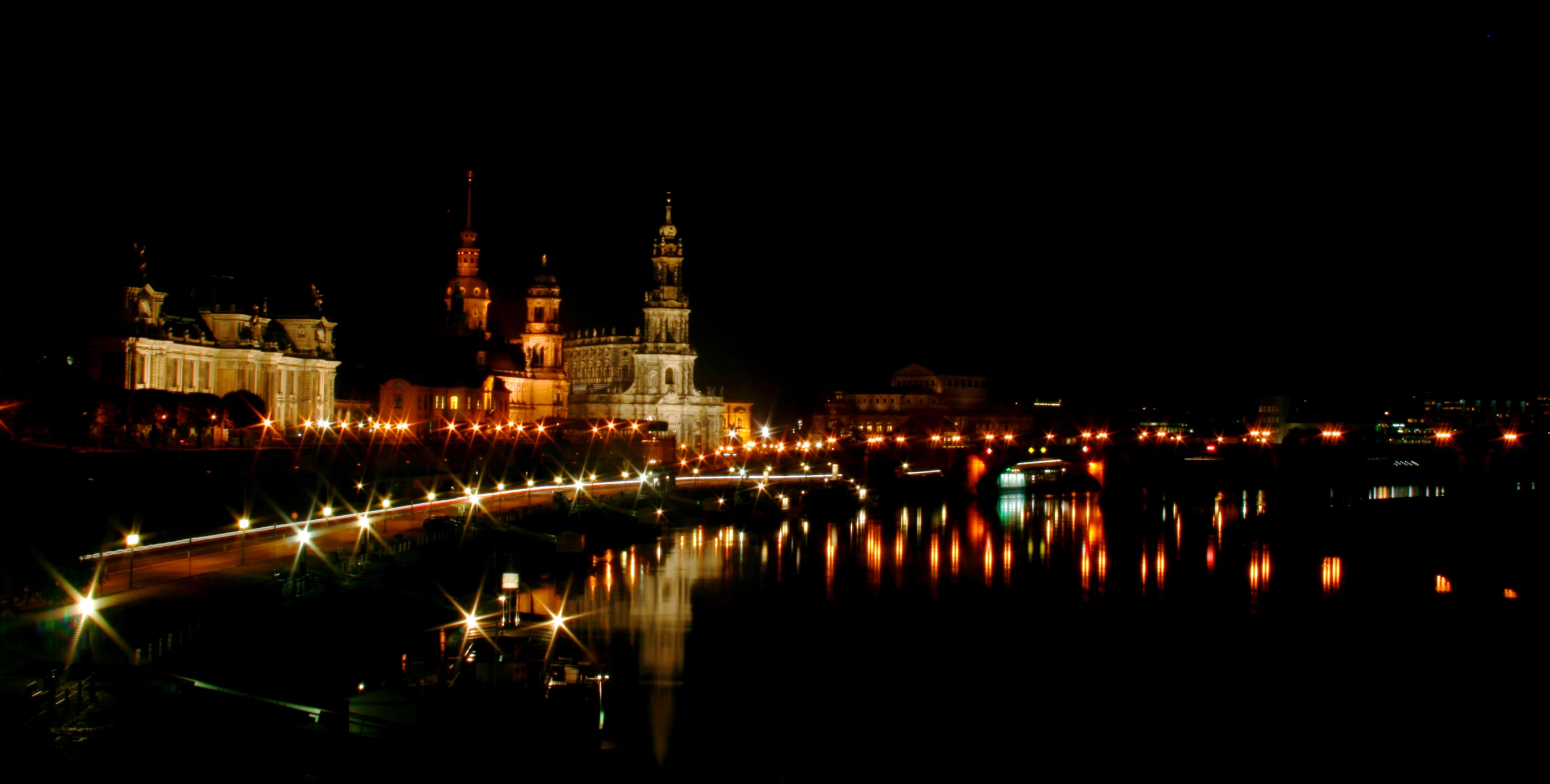 a castle is illuminated in the night time sky