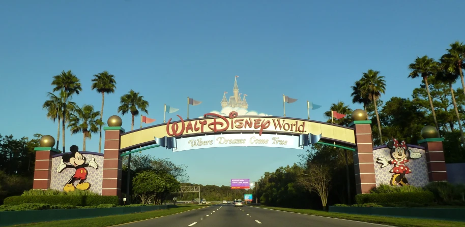 the entrance to walt world is decorated with mouse and mickey