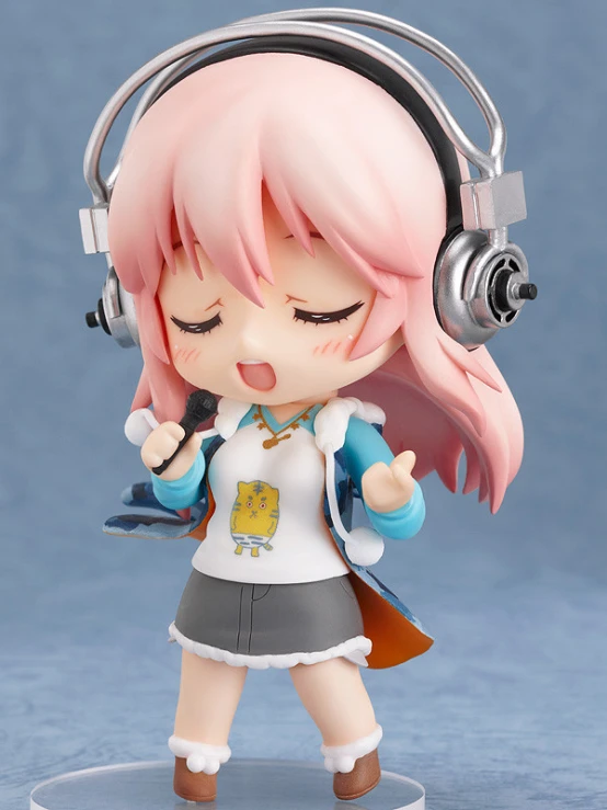 a doll with headphones is posing for a po