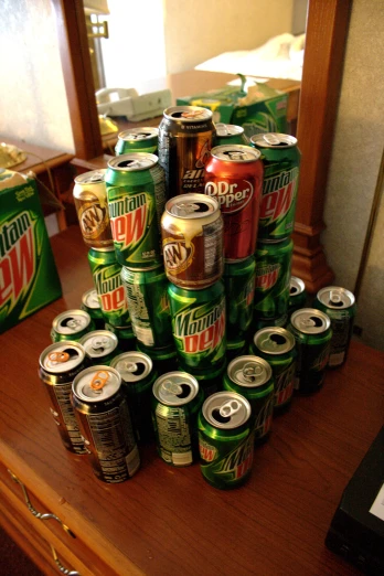 a pile of cans sitting on top of a table