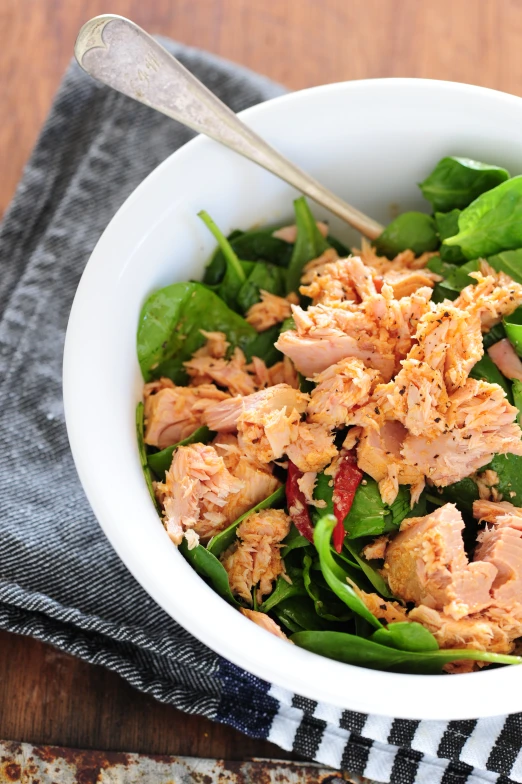 the food in the bowl is prepared to be eaten