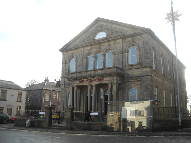 there is a old building with a massive front entry