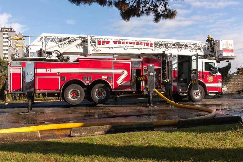 firetruck parked in front of a building in an urban setting