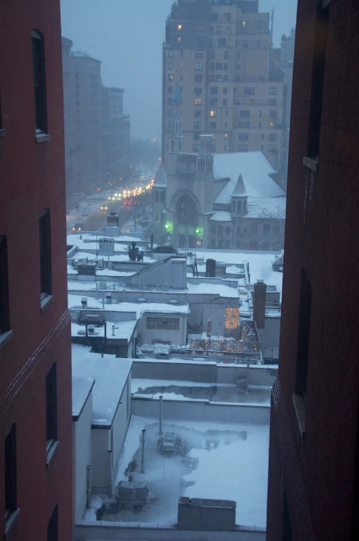 a snow covered skyline taken from an outside window