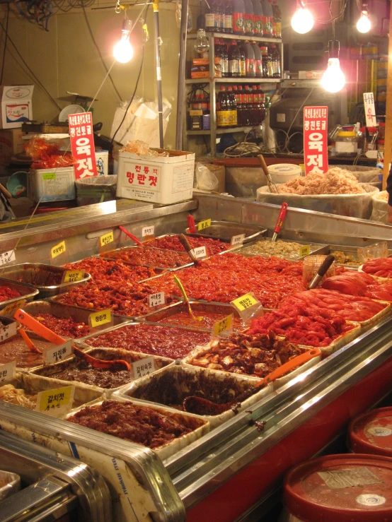 a large display case filled with lots of meat