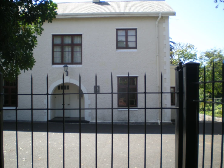 the building has two windows and several doors