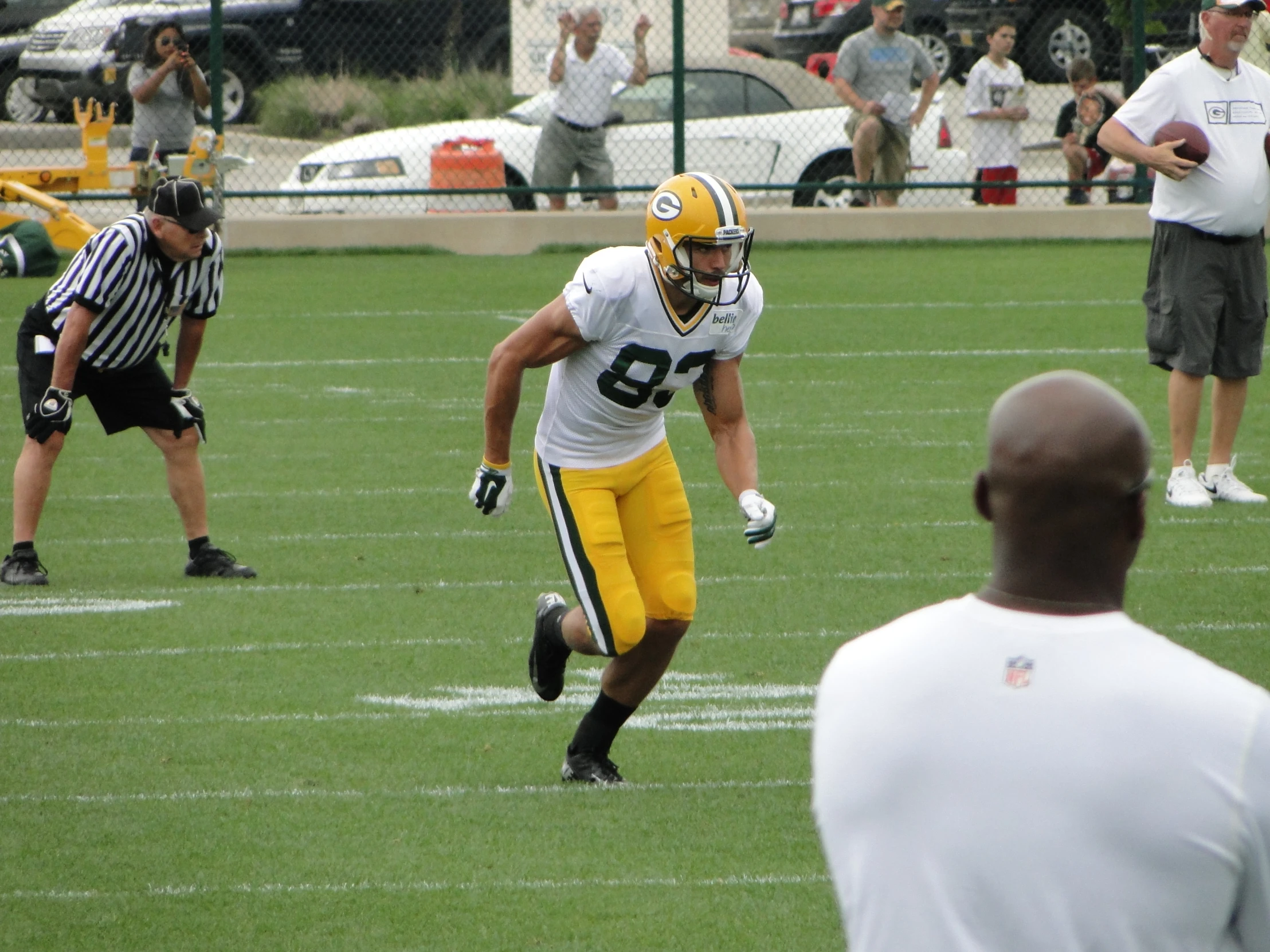 a young football player running with the ball