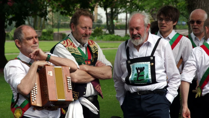 an image of a group of people playing instruments