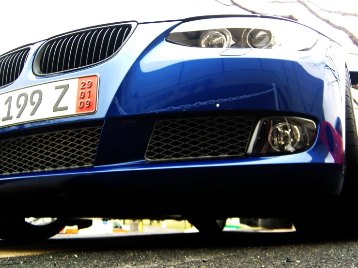 a close up view of a car with the front bumper