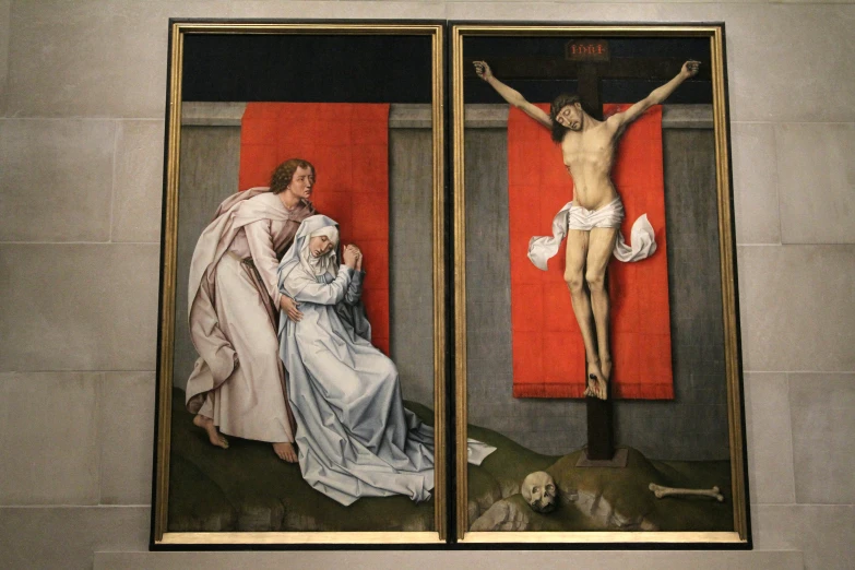 this is a picture of a crucifix between two paintings