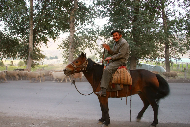 a man riding on the back of a horse