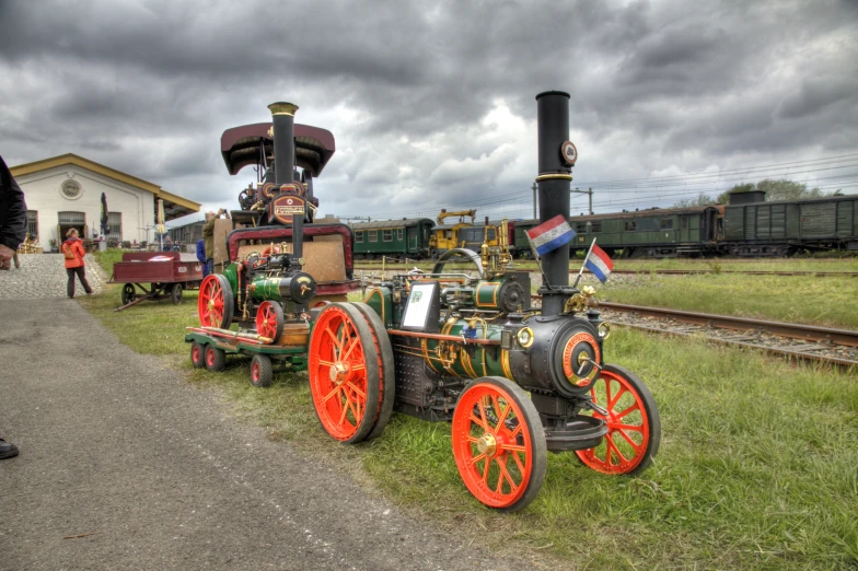 an antique toy steam engine train in the field