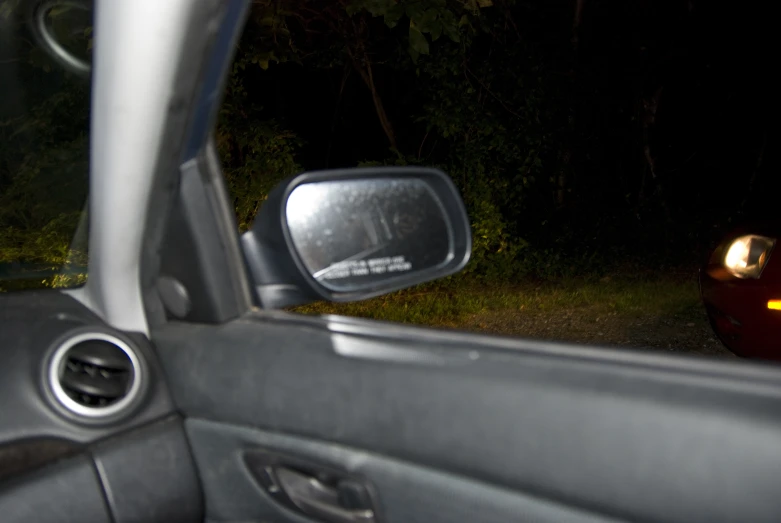 the view of someone's car from behind the wheel