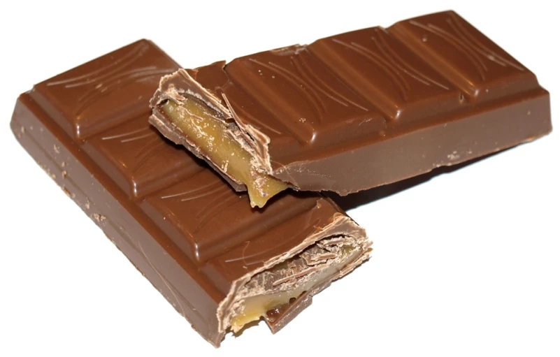 two pieces of chocolate with a peanut er filling
