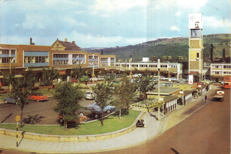 a town with many houses and cars parked