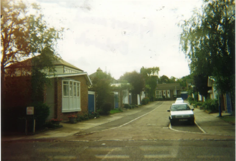 a car parked on the street in a residential area