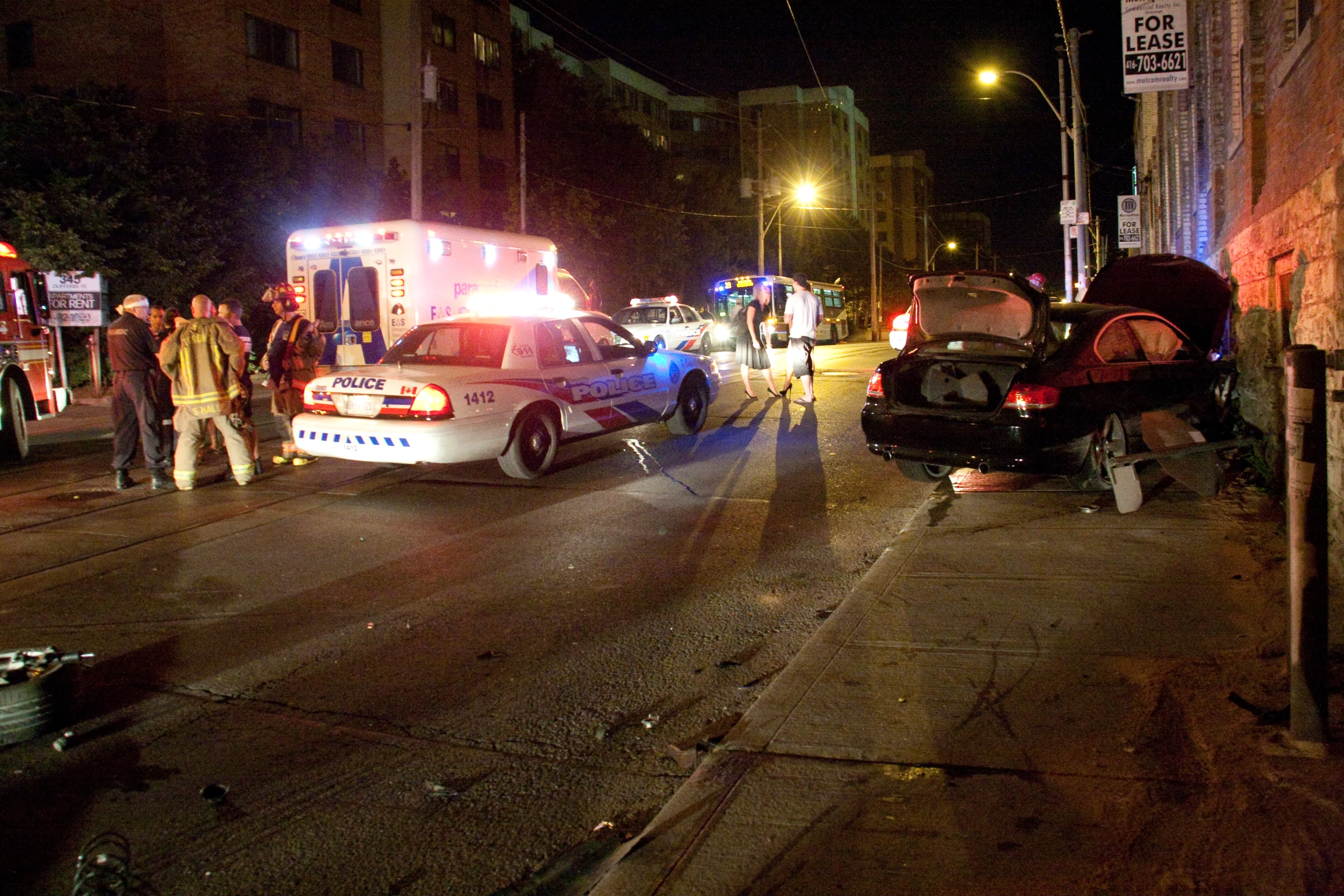 emergency respond responders gather to a wrecked police car