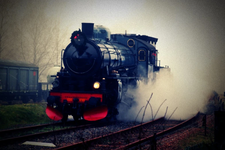 black train with steam coming out of it
