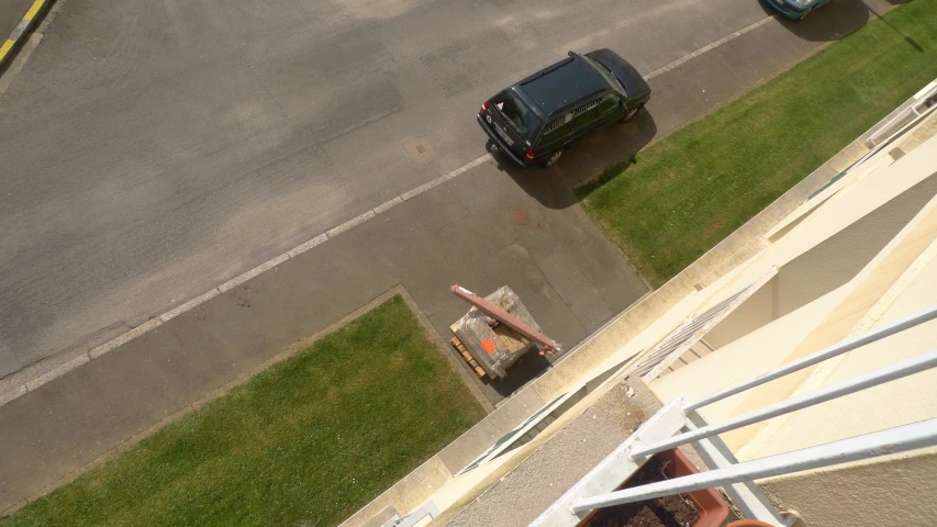 looking down at a truck parked on a parking lot