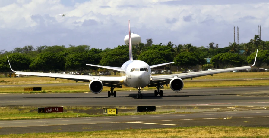 a large airplane is going down the runway