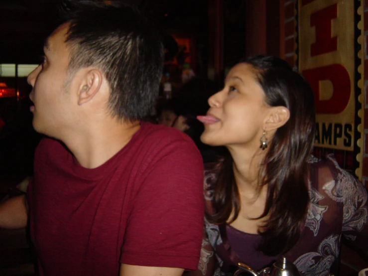 a man and a woman sitting at a table