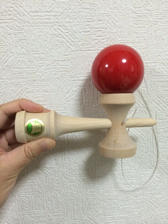 a wood spinning wand that has been used to make a decorative item