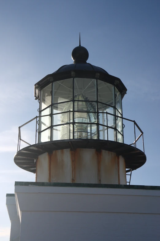 a large light house with a clock on it