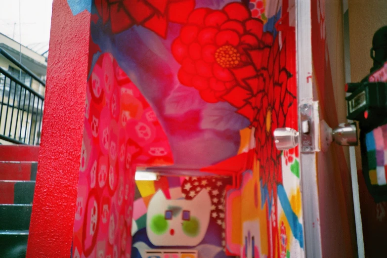 this stairwell has been adorned with red, white and blue painting