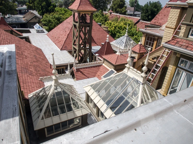 this aerial view shows all the roofs and the large steeples