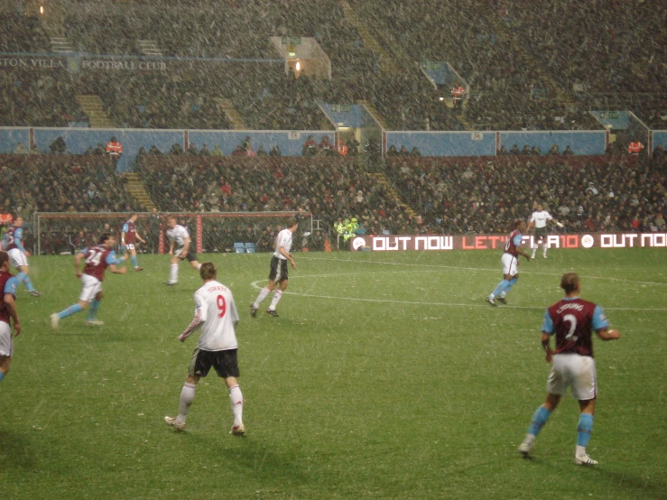 a soccer team playing on the field during a match