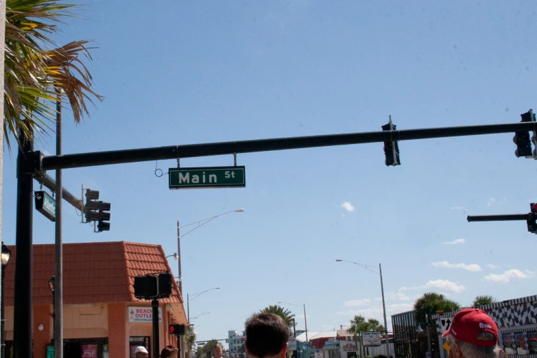 a traffic light showing the green light on a city street