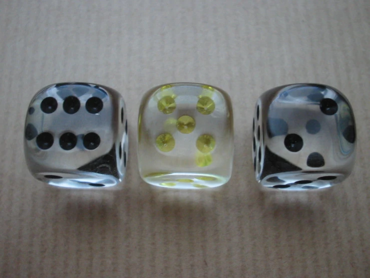 two dices that have some sort of color and black and white design