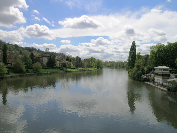 a view of a river with houses on the side