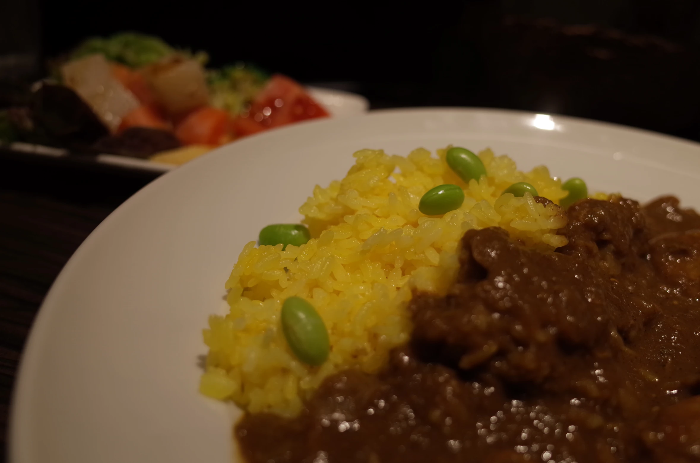 a plate of food that includes rice and meat