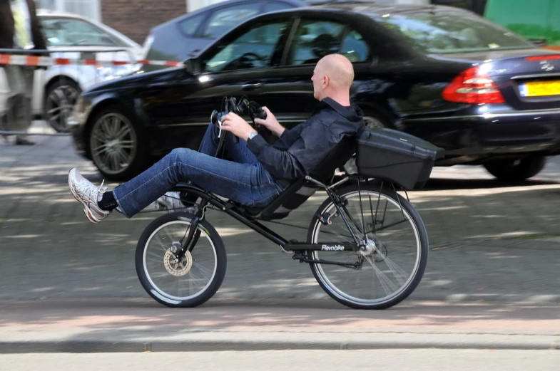 an individual is in the middle of riding a bike