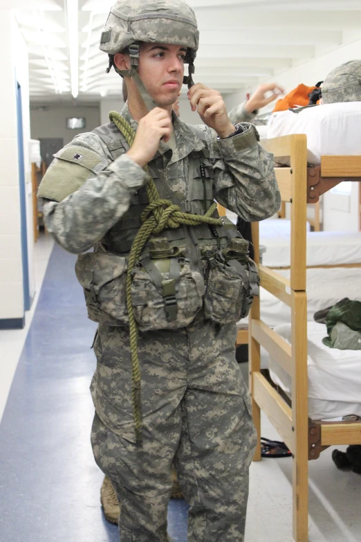 a soldier brushing his teeth in the hospital