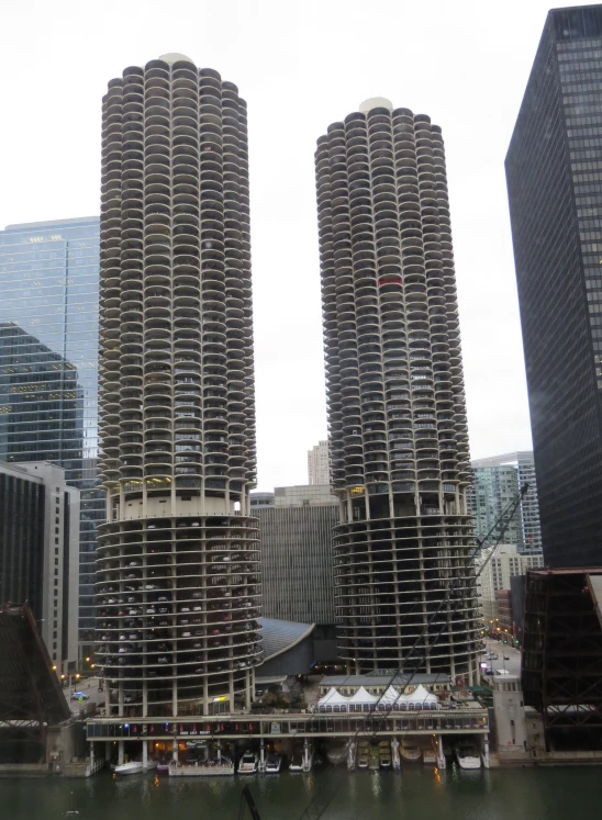 a view of buildings in a harbor and water