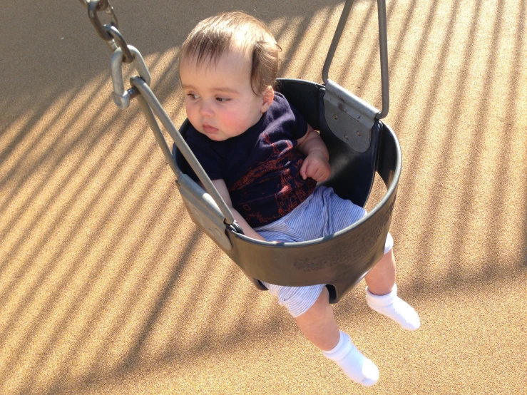 an image of a toddler at the playground