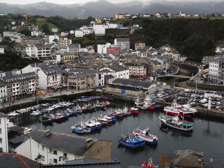 a large marina with many boats inside of it