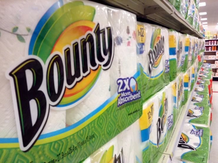 a row of bottled laundry detergents sitting on display at a store