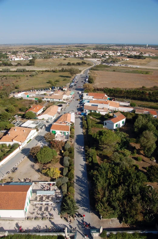 a long view of the street with cars on it